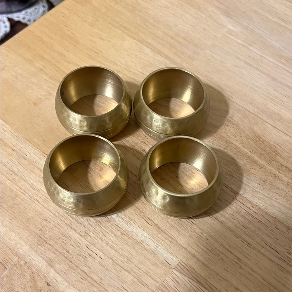 Set of Four Hammered Metal Gold Tone Napkin Rings